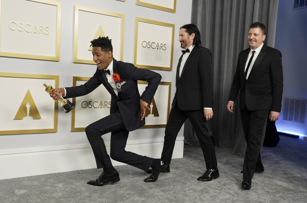 Jon Batiste, Trent Reznor, and Atticus Ross at the 2021 Oscars