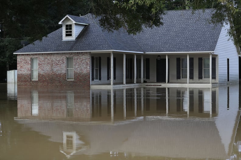 A home in Denham Springs, LA surrounded by water.