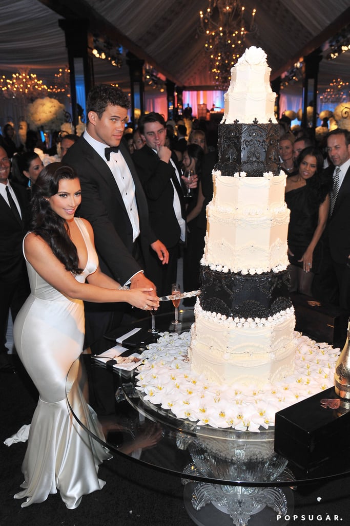 Cut Enormous Wedding Cake 