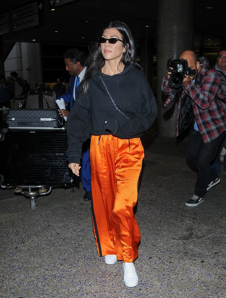 Wearing Tiny Sunglasses With Orange Track Pants