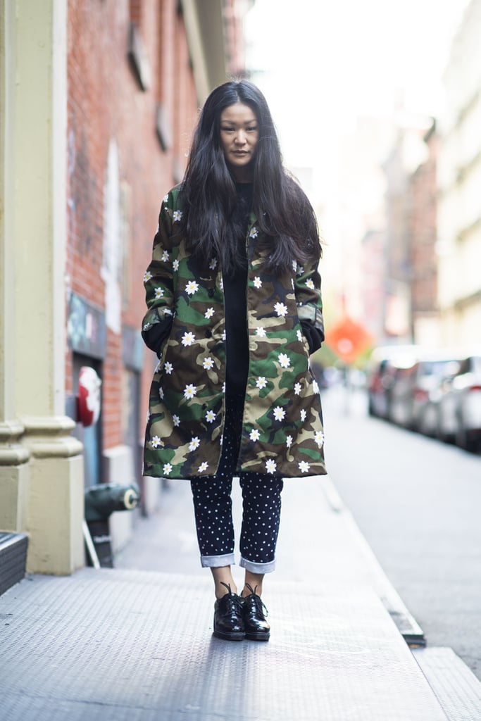 Layers don't mean covering up your style — a bold camo-print coat was the perfect way to show it off. 
Source: Le 21ème | Adam Katz Sinding