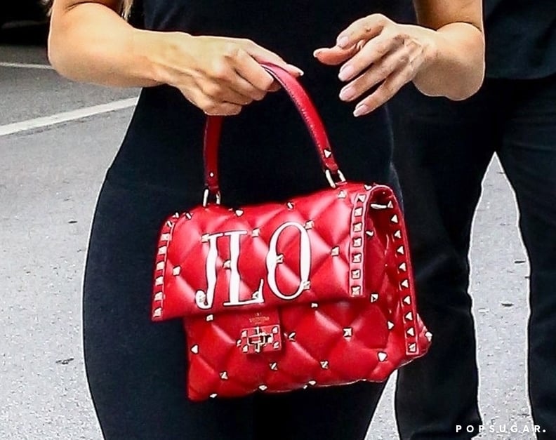 Jennifer Lopez Takes Her Customized Red Valentino Bag to the Gym – Footwear  News