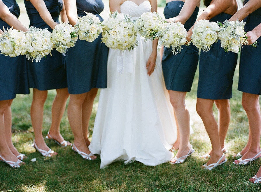 Whether you're a first-time bridesmaid this wedding season or have 27 dresses hanging up in the back of your closet, it's good to keep in mind these bridal party faux pas from POPSUGAR Love.
Photo by Emma Freeman Photography via Style Me Pretty