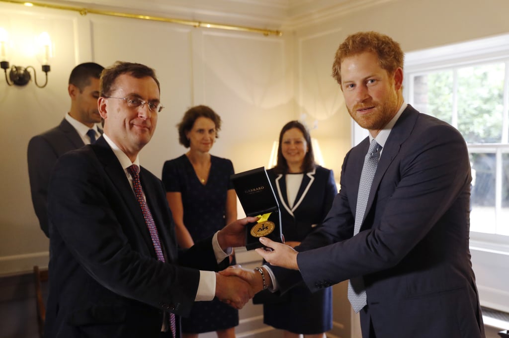 After Sergeant Elizabeth Marks won gold at the Invictus Games in Orlando, FL, she asked Harry to personally donate the medal to Papworth Hospital in the UK as a thank you for saving her life in 2014. In June, the prince fulfilled her request by presenting the medal to Dr. Alain Vuylsteke.
