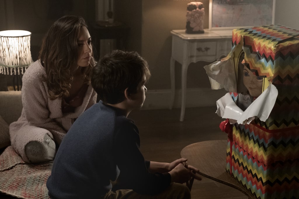 Andy and his mom, Karen (Aubrey Plaza), lay eyes on the cursed Buddi doll for the first time.