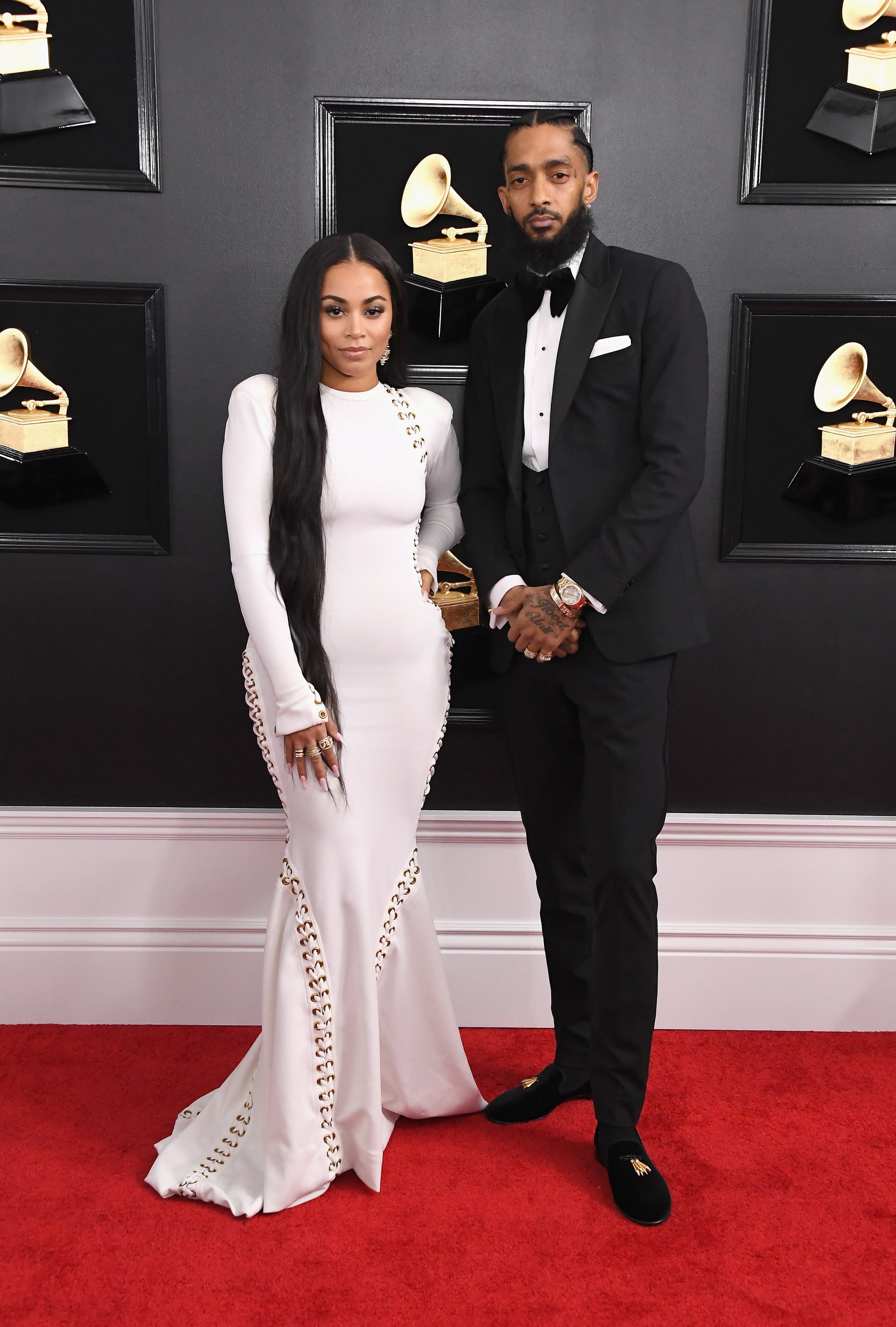 LOS ANGELES, CA - FEBRUARY 10:  Lauren London (L) and Nipsey Hussle attend the 61st Annual GRAMMY Awards at Staples Centre on February 10, 2019 in Los Angeles, California.  (Photo by Steve Granitz/WireImage)