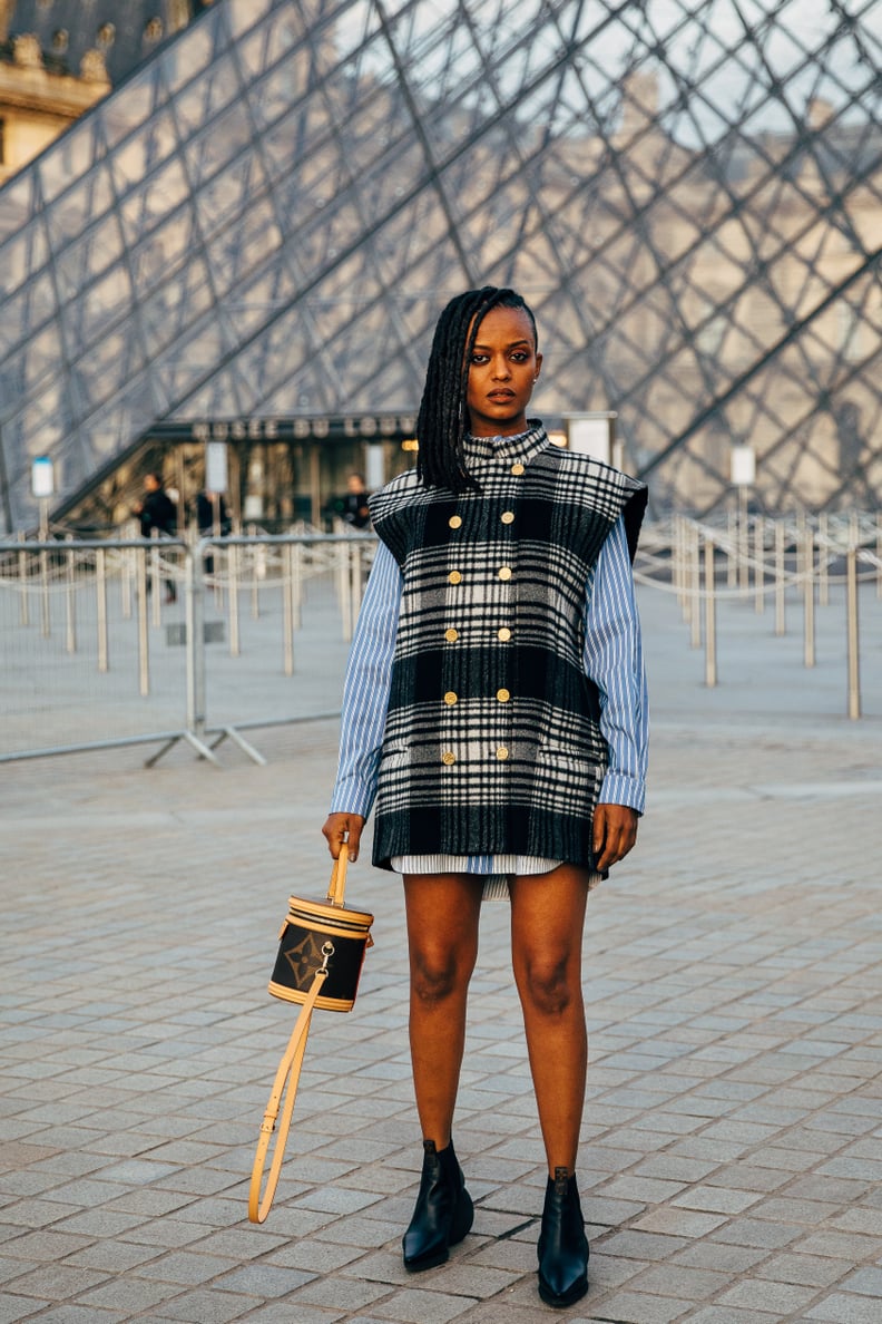 Wear a Long Vest Over an Oversize Printed Shirt With Ankle Boots