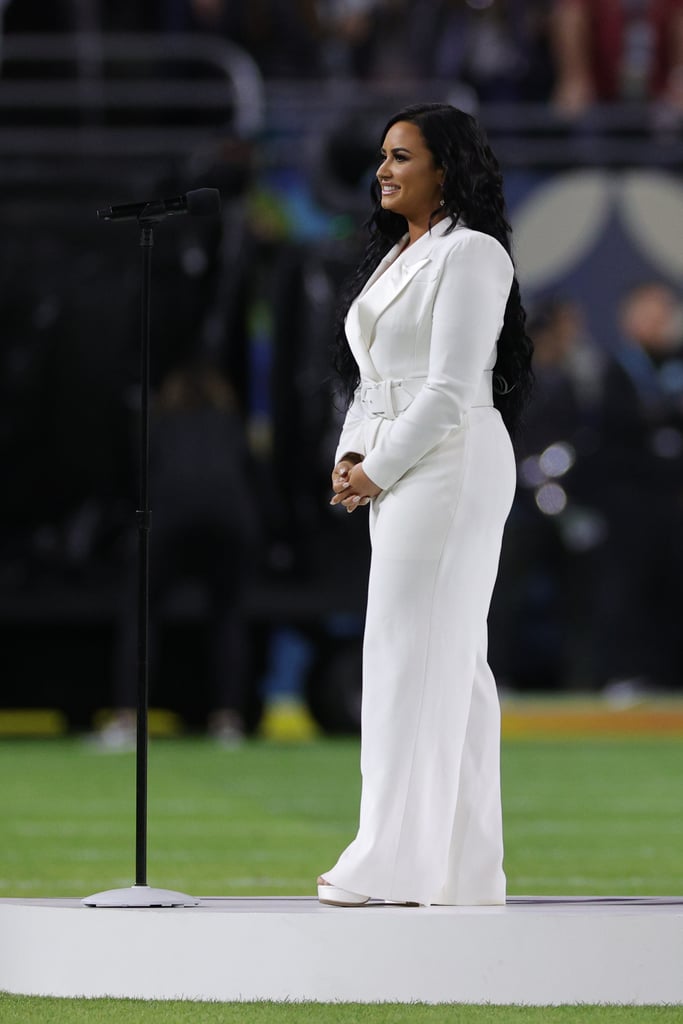 Demi Lovato's White Sergio Hudson Jumpsuit at the Super Bowl