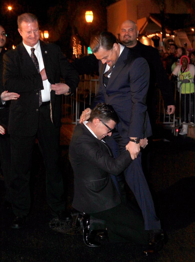 Leonardo DiCaprio couldn't help but laugh when a man ran over and hugged his crotch when he attended the Santa Barbara International Film Festival in California on Thursday.