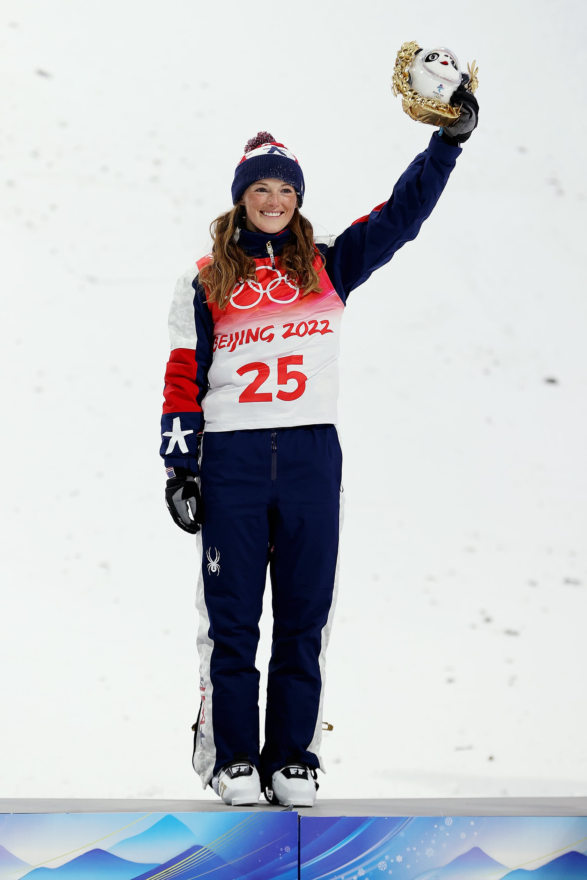 ZHANGJIAKOU, CHINA - FEBRUARY 14: Bronze medalist Megan Nick of Team United States celebrates during the Women's Freestyle Skiing Aerials Final flower ceremony on Day 10 of the Beijing 2022 Winter Olympics at Genting Snow Park on February 14, 2022 in Zhangjiakou, China. (Photo by Cameron Spencer/Getty Images)