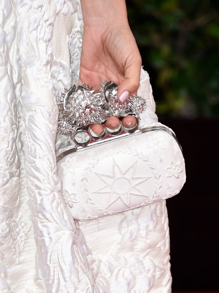 Salma Hayek toughened up her gown with this McQueen clutch.