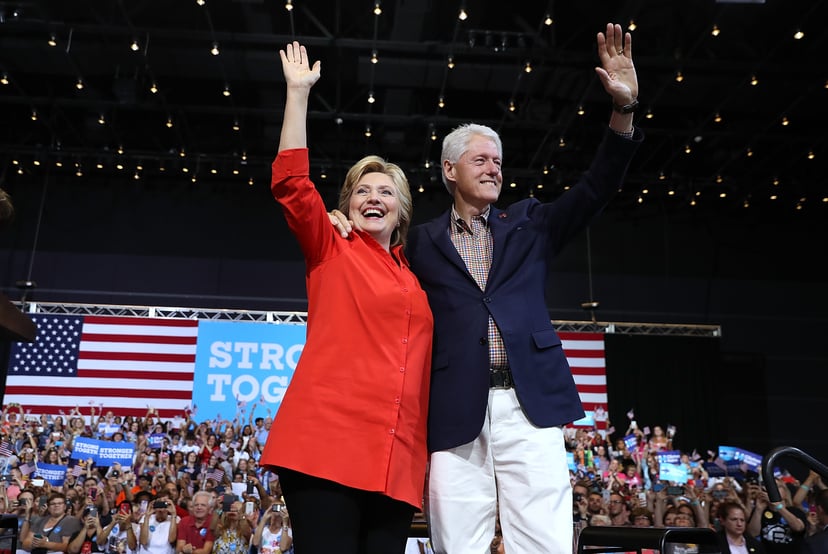 PITTSBURGH, PA - JULY 30:  Democratic presidential nominee former Secretary of State Hillary Clinton and her husband former U.S. president Bill Clinton greet supporters during a campaign rally with democratic vice presidential nominee U.S. Sen Tim Kaine (