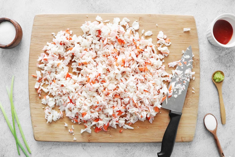 Crab meat on cutting board