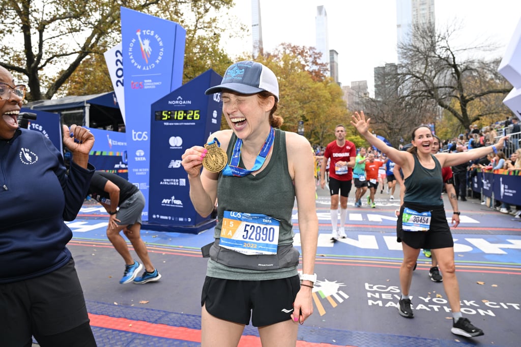 艾莉Kemper跑在2022年的纽约马拉松比赛”class=