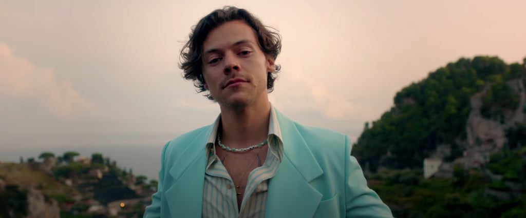 He accessorized his blue suit with a beaded Éliou necklace that said "GOLDEN."