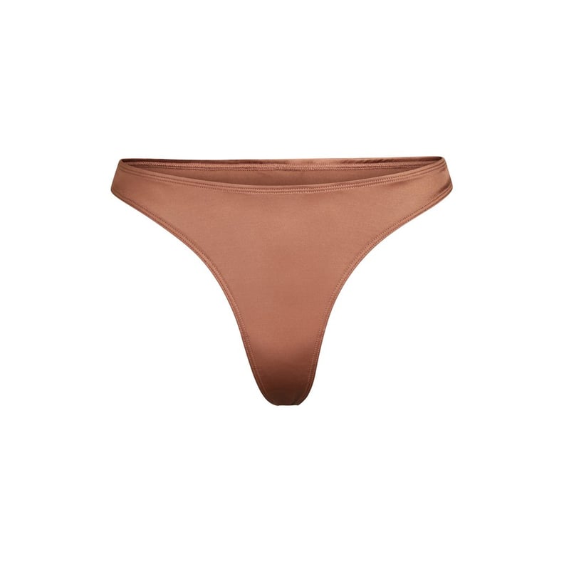 Skims Stretch Satin Thong in Jasper