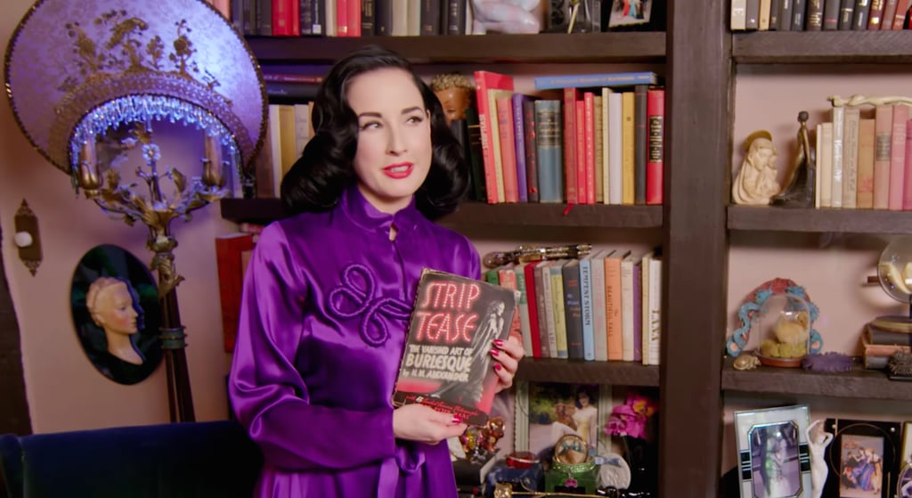 Here, Dita is showing off her collection of vintage and rare books.