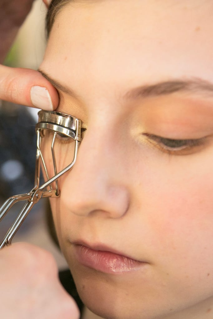 To make the neutral eye makeup pop, Bettelli went back and curled the eyelashes.