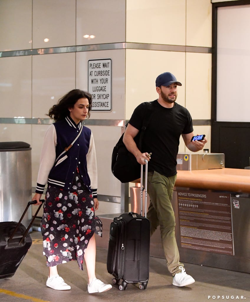 Chris Evans and Jenny Slate were spotted making their way through LAX after arriving on a flight on Sunday. The couple stayed close as they held on to their luggage and Chris checked out something on his cell phone. Jenny and Chris were likely touching down in LA just before the Captain America: Civil War star attended the Teen Choice Awards; Chris won the award for choice movie actor in a sci-fi or fantasy film for the blockbuster hit and gave a short but sweet speech, telling the crowd that he thought his win might be "a mistake" but that he's "always wanted" one of those giant surfboards.
Chris and Jenny's romance blossomed back in March and was first reported in May. It was revealed that the two hit it off while filming Gifted together last year and began seeing each other after Jenny announced plans to divorce her husband of four years, Dean Fleischer-Camp. She and Chris made their first public appearance in June when he showed up to support her at the NYC premiere of The Secret Life of Pets.