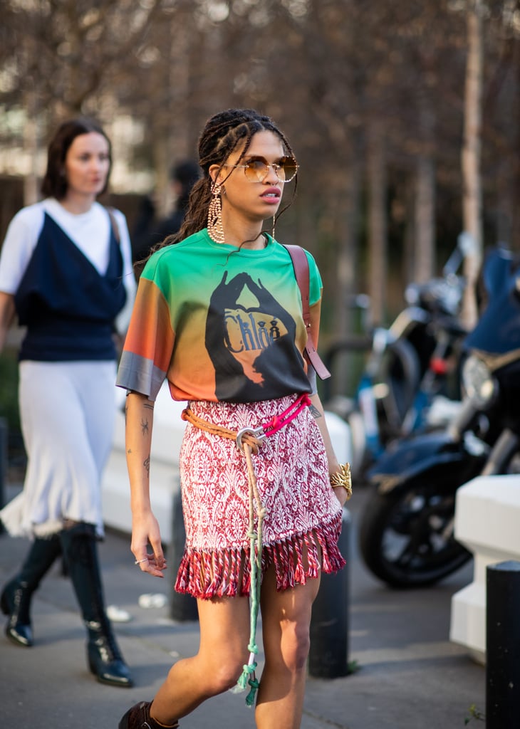 Go bold and pair a graphic tee with a printed miniskirt.