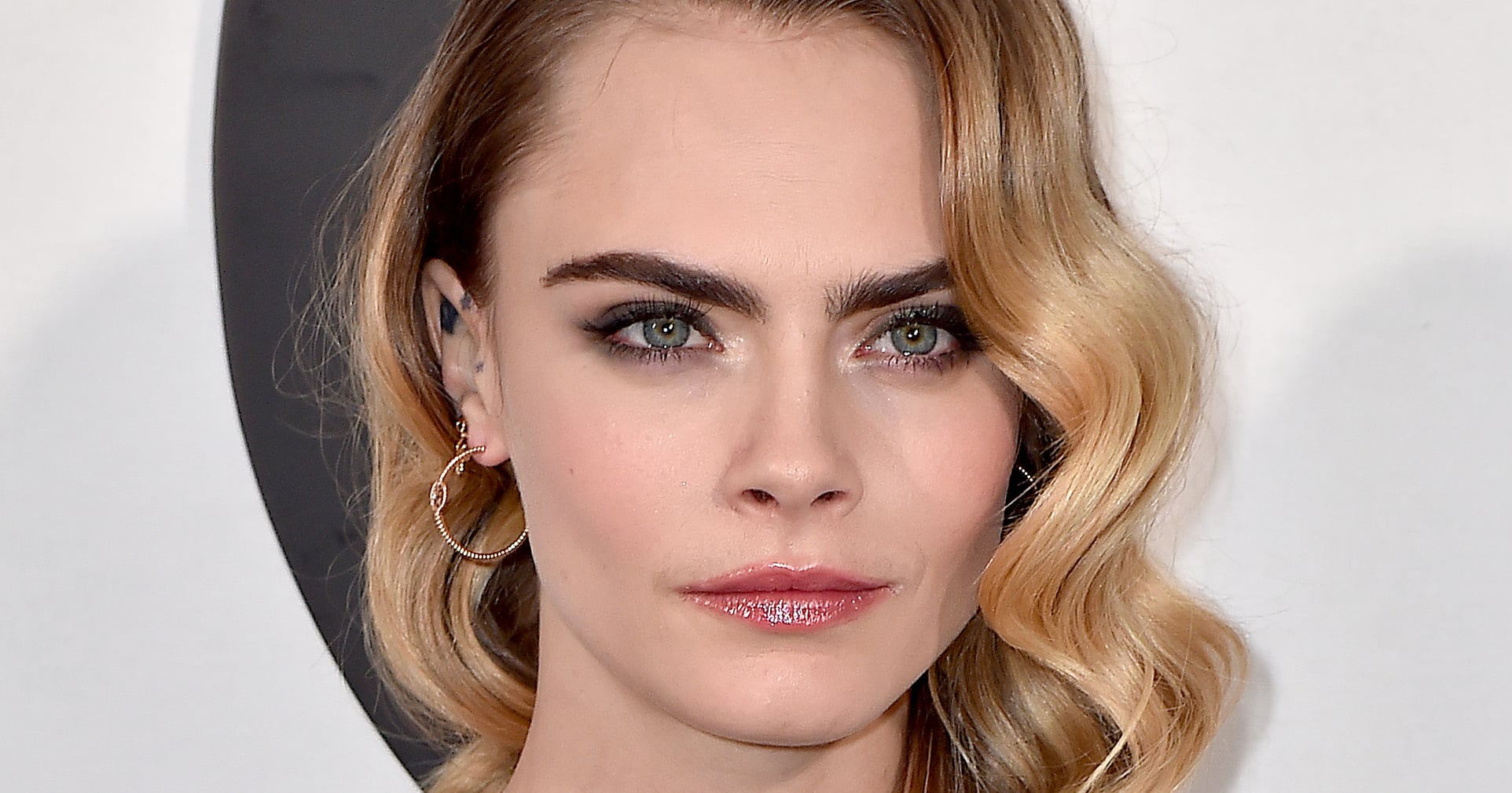CARA DELEVINGNE TURNS TO THE DARK SIDE WITH NEW SHAGGY BRUNETTE visual data 6