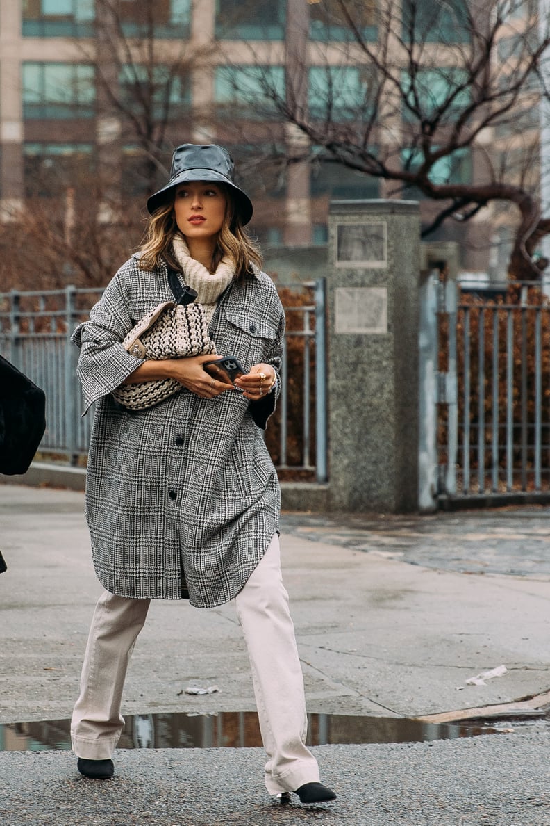 How to Wear a Shirt Jacket: With a Turtleneck + Pants + a Clutch + a Bucket Hat