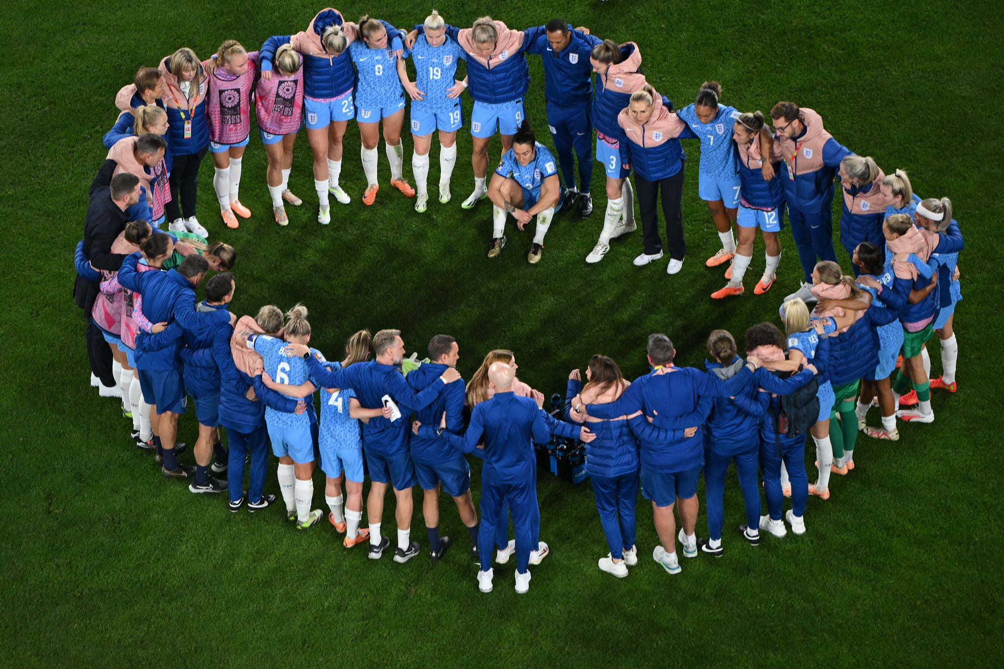 SYDNEY, AUSTRALIA - AUGUST 20: England players huddle after the team's defeat following during the FIFA Women's World Cup Australia & New Zealand 2023 Final match between Spain and England at Stadium Australia on August 20, 2023 in Sydney, Australia. (Photo by Quinn Rooney/Getty Images)