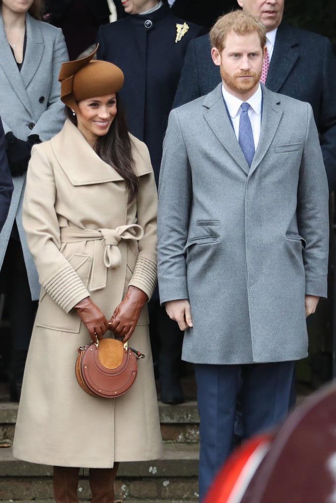 For the Christmas Day church service in Sandringham, Harry wore a grey coat, while Meghan opted for a camel Sentaler piece, which she accessorised with a brown fascinator, matching gloves, over-the-knee Stuart Weitzman boots, and an eye-catching Chloé bag.