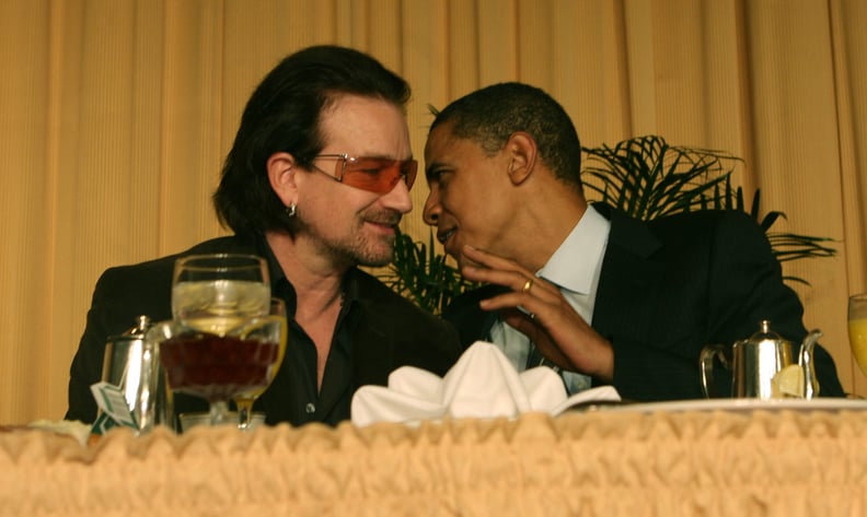 Whispering to Bono at the National Prayer Breakfast in 2006