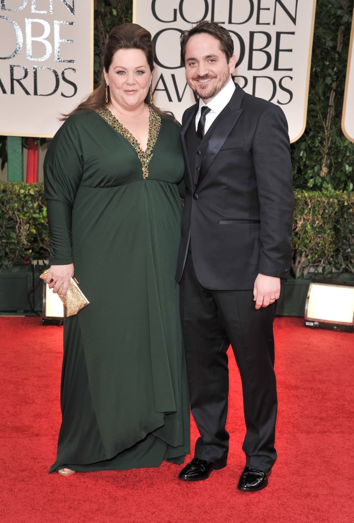 We're green with envy over this forest green number — and how cute Melissa looks with her husband, Ben Falcone.