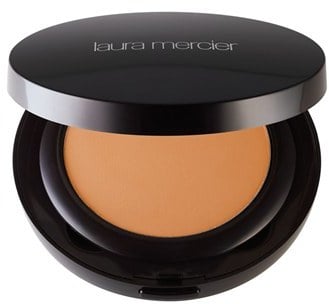 This foundation lasts all day and it's easy to store for touch-ups. 
Laura Mercier Smooth Finish Foundation Powder ($48)