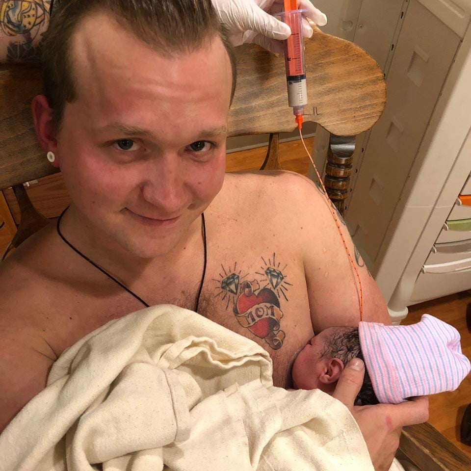 Dad Breastfeeds Newborn Daughter