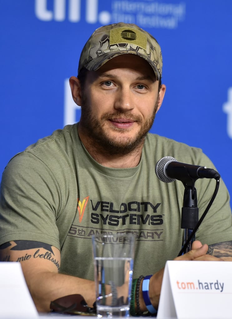 Tom Hardy went for a rugged look at the press conference for The Drop.