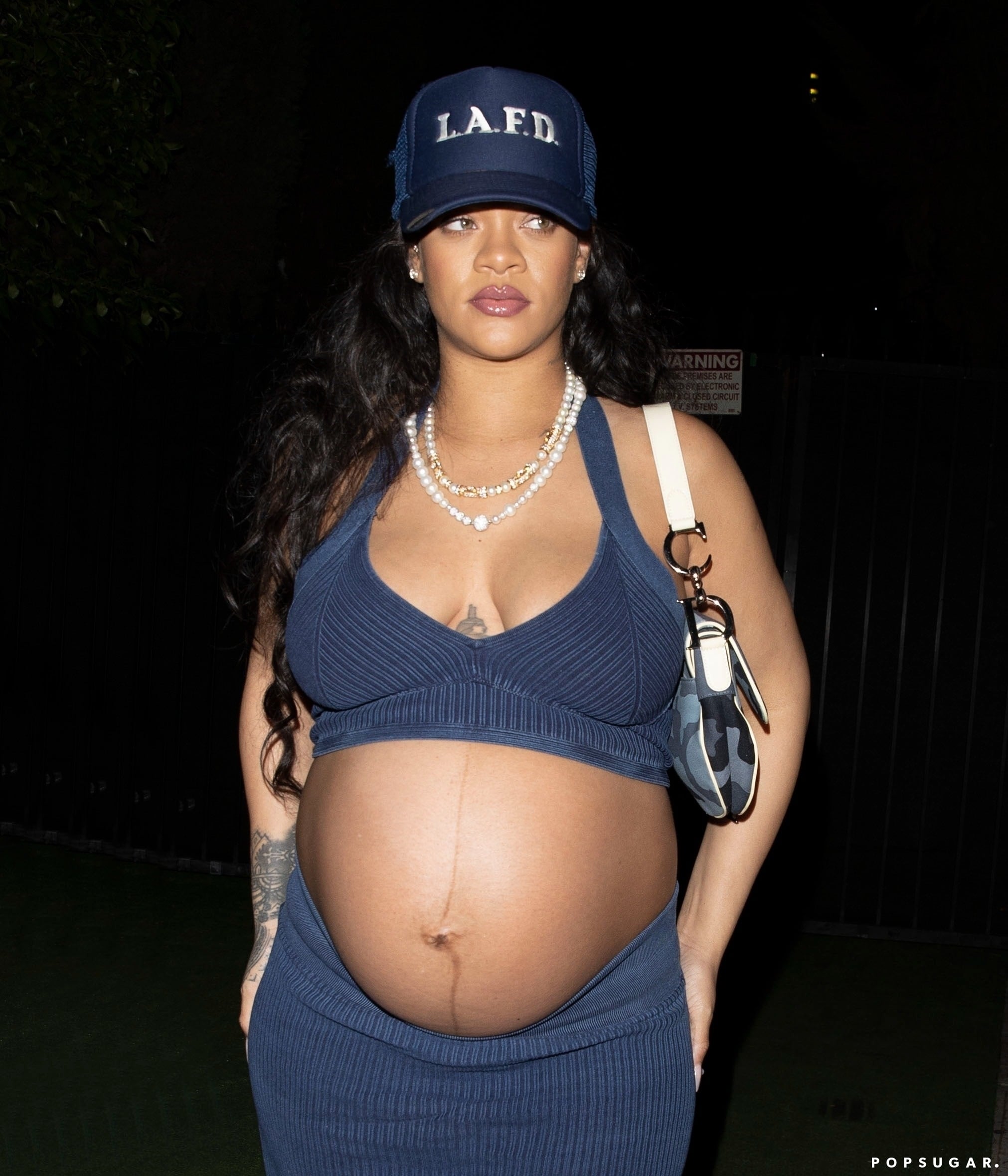 Pregnant Rihanna showcases her growing baby bump in lingerie to