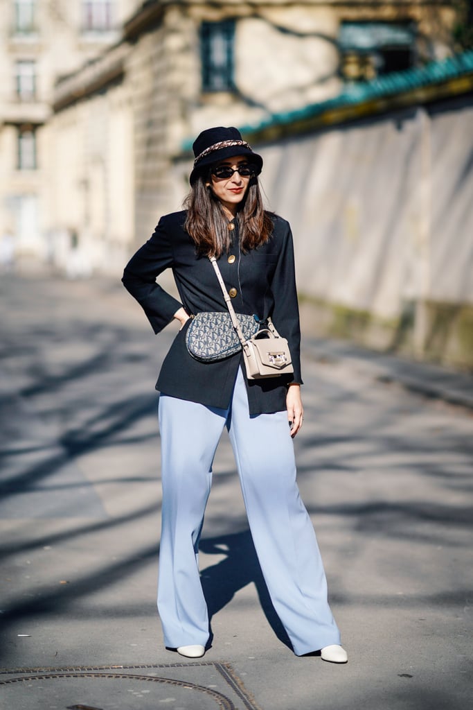 Give classic separates a forward twist by styling with a bucket hat, white shoes, and double bags.