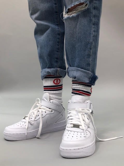 "We just tried to do things like do this, do the roll at the hem of her jeans. And she has athletic socks [with] stripes that we always kind of saw, and her hat and her jean jacket.  She was always wearing her Nike Airs and things like that, so we just tried to give her points of interest for her fashion."