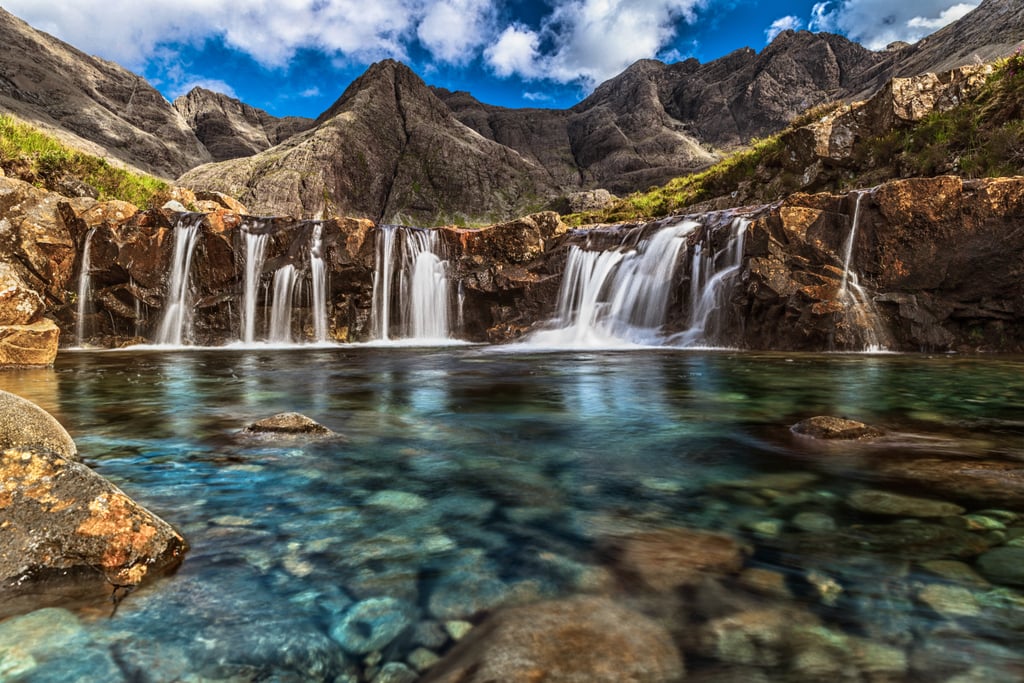 See the Fairy Pools in Scotland