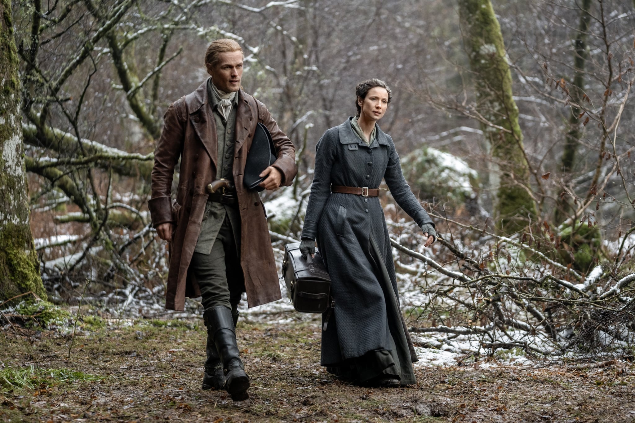 OUTLANDER, from left: Sam Heughan, Caitriona Balfe, Echoes', (Season 6, ep. 601, aired Mar. 6, 2022). photo: Robert Wilson / Starz / Courtesy Everett Collection