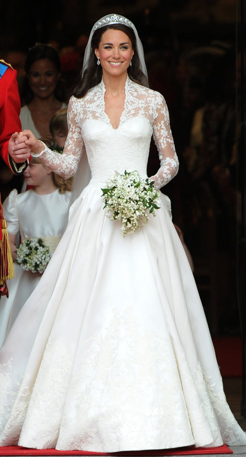 Both Dresses Featured Elegant Lace Sleeves, a Sweetheart Neckline, and a Long Train