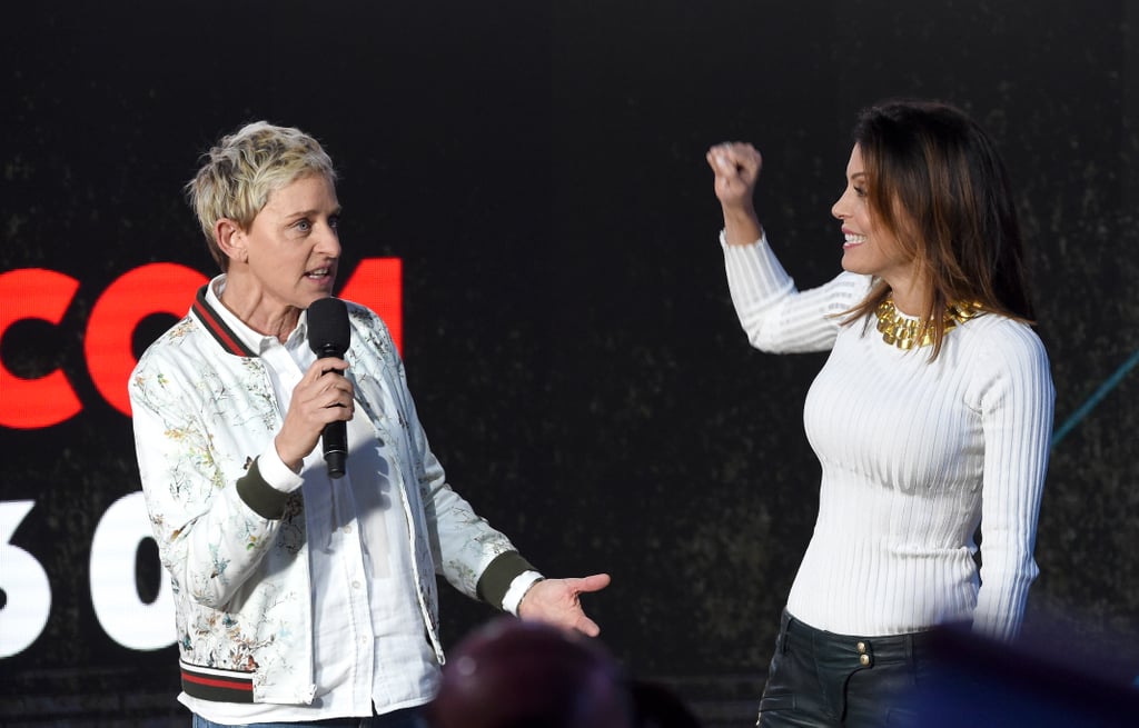 Ellen DeGeneres and Bethenny Frankel speaking on stage in Los Angeles.