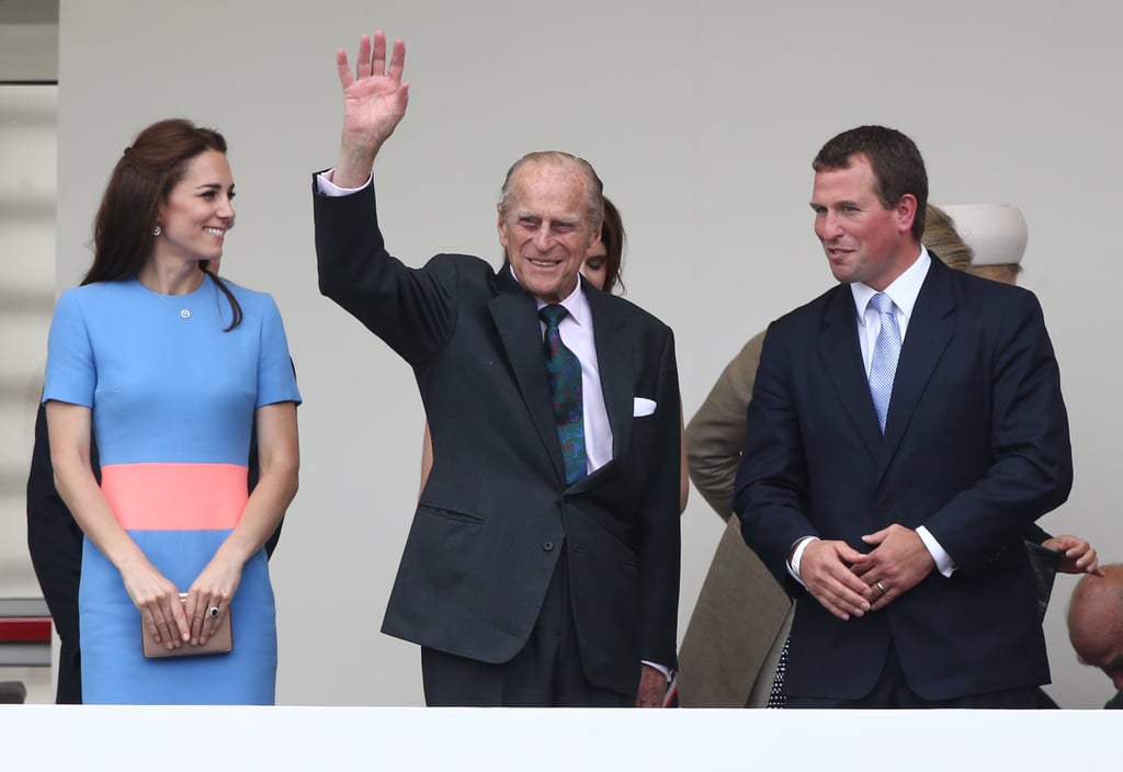 Philip was flanked by the Duchess of Cambridge and his grandson Peter Phillips as he gave a wave to guests at a celebration for Queen Elizabeth's 90th birthday in June 2016.