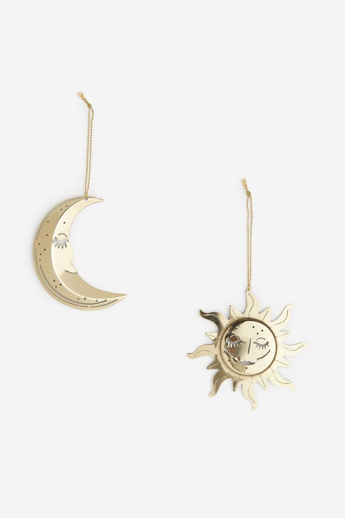 A Pair of Golden Ornaments From the H&M Home Holiday Collection