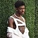 Lil Nas X Wears a White Balmain Pantsuit and Bandage Top