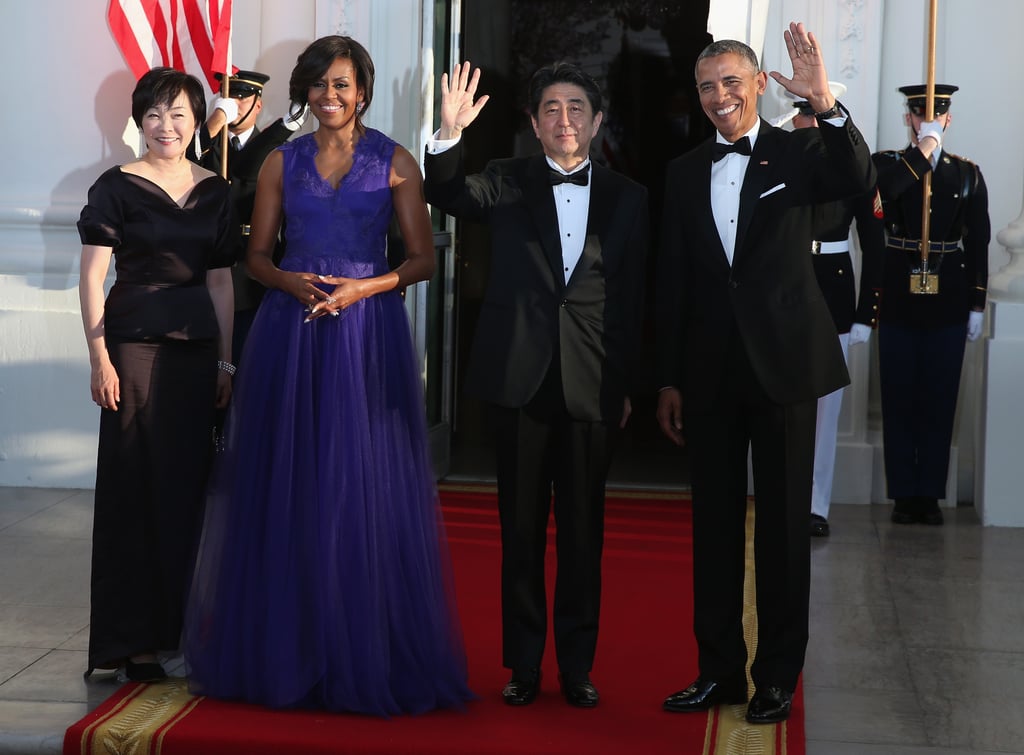 Michelle stole the spotlight in her jewel-toned gown.