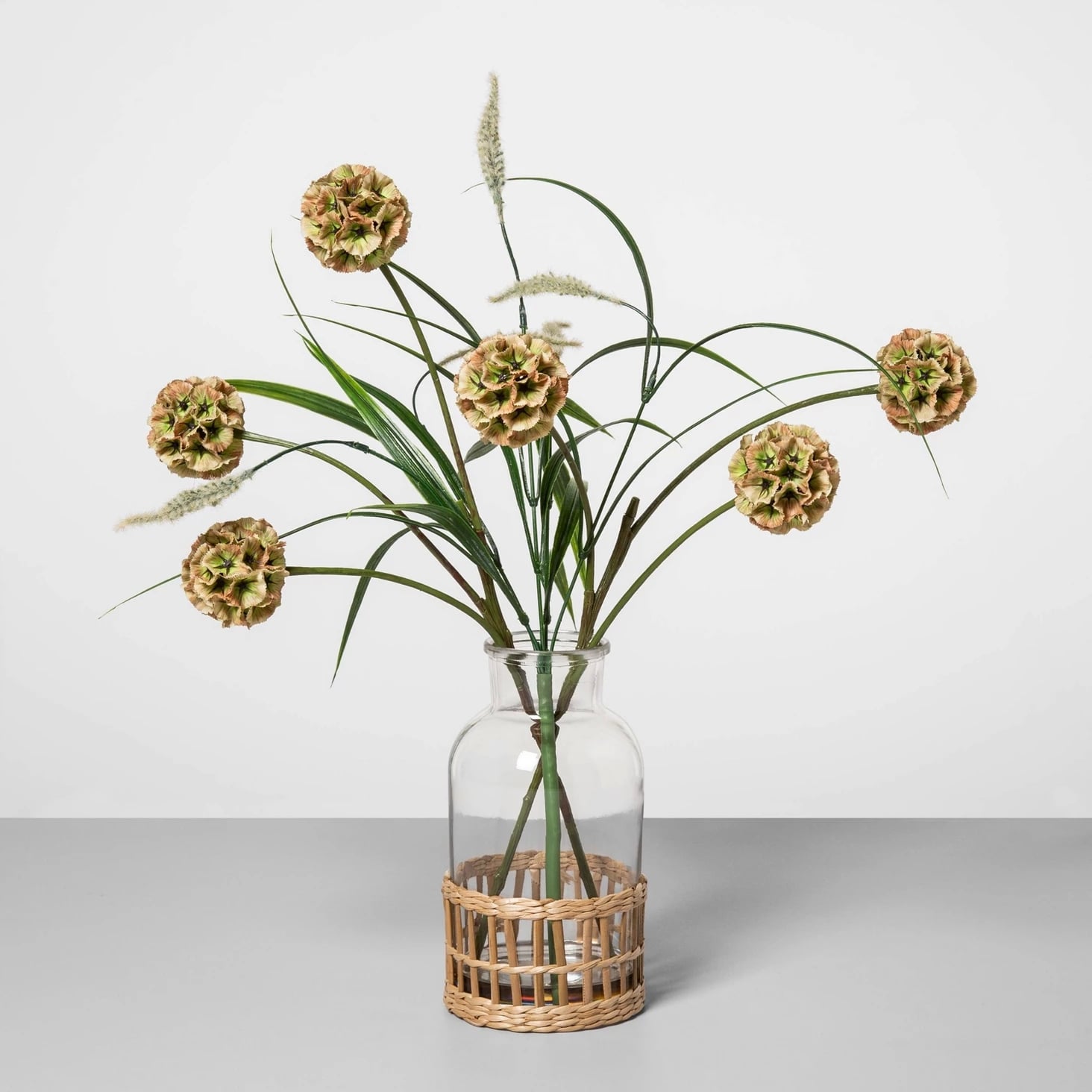 Artificial Pod Flower Arrangement In Glass Vase In Green Clear