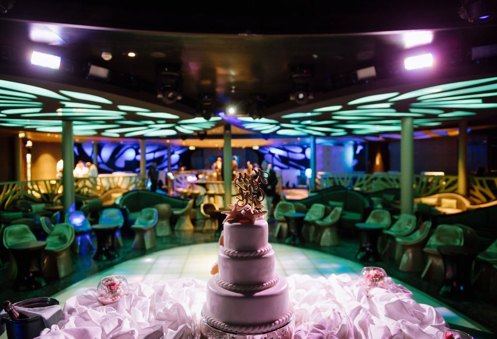 The wedding cake was a three-tiered peanut butter and chocolate cake, exclusively designed by Disney's pastry chefs. In keeping with The Little Mermaid theme, the cake featured chocolate and peanut butter sea shells, star fish, and other candies that were passed around throughout the reception, the couple revealed.