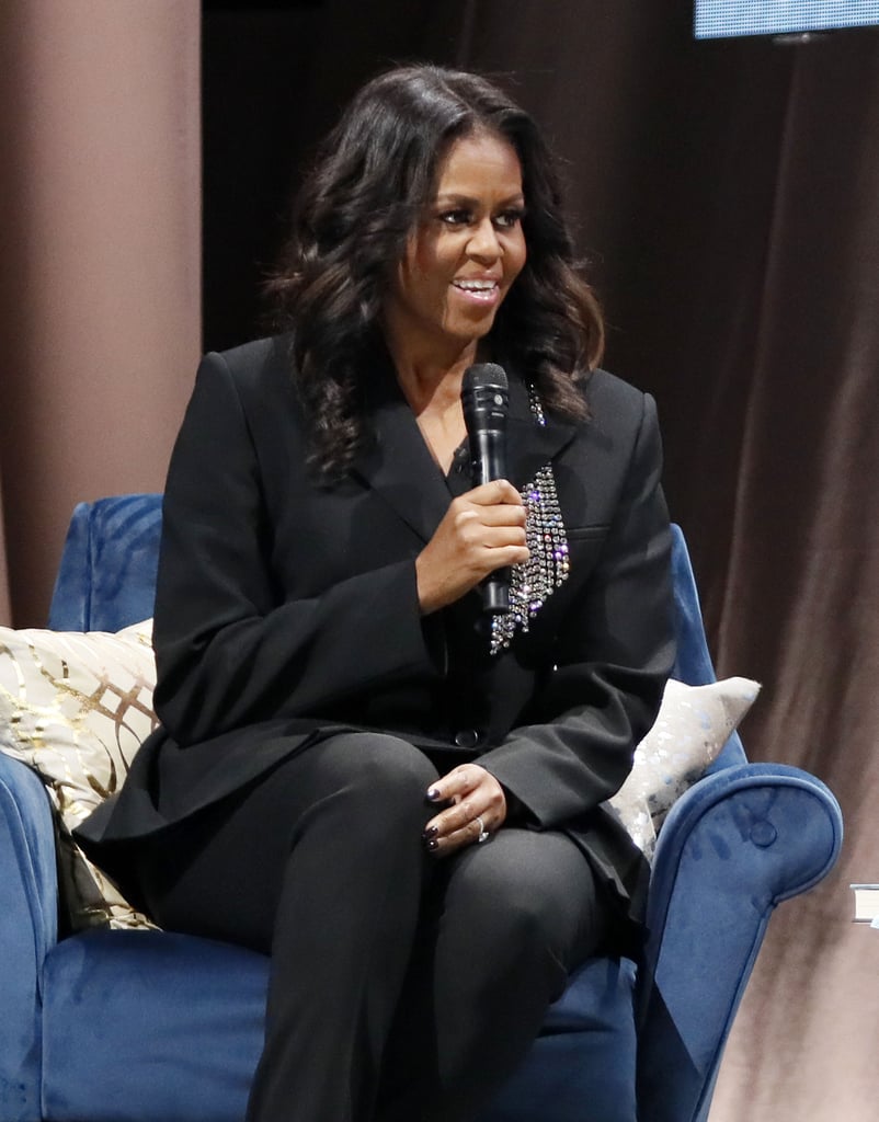Michelle joined moderator Valerie Jarrett on stage in Washington DC, where she discussed her new book in a stunning Christopher Kane suit that came complete with chandelier crystals along the lapel. Michelle's husband, Barack, even stopped by the event. Michelle finished her spiffy outfit with simple black patent leather pumps.