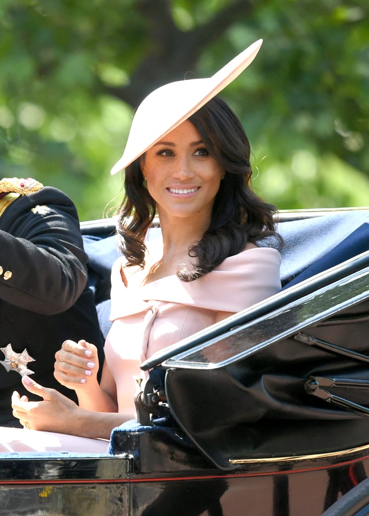 For her very first appearance at Trooping the Colour, Meghan opted for a stunning off-the-shoulder ensemble by Carolina Herrera.