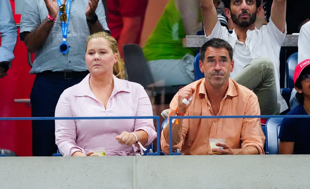 Amy Schumer and Chris Fischer at the US Open on Sept. 9.