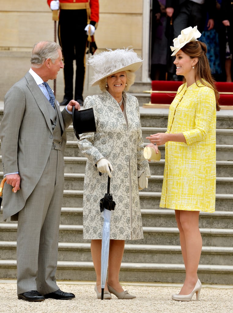 A pregnant Kate and her in-laws were all smiles while attending a reception in 2013.